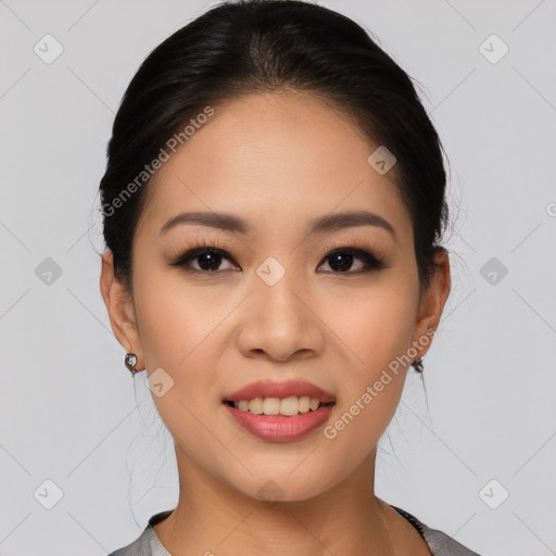 Joyful asian young-adult female with medium  black hair and brown eyes