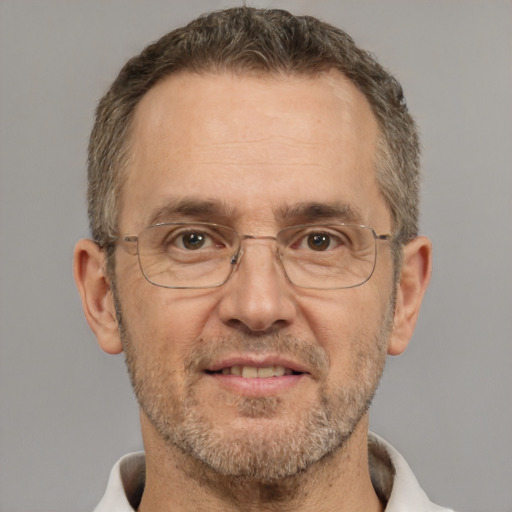 Joyful white middle-aged male with short  brown hair and brown eyes