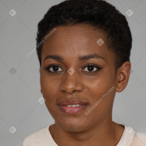 Joyful black young-adult female with short  black hair and brown eyes