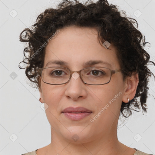 Joyful white adult female with short  brown hair and brown eyes