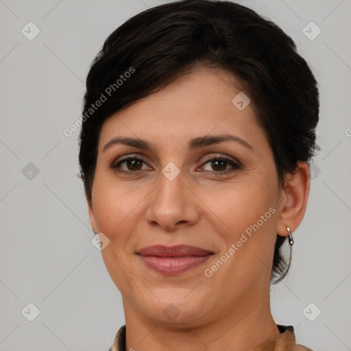 Joyful white adult female with medium  brown hair and brown eyes