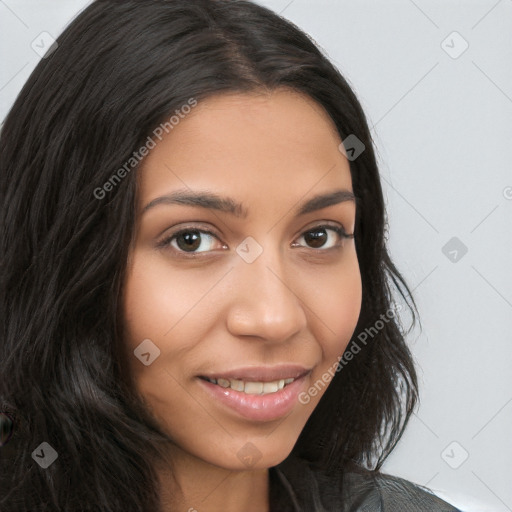 Joyful latino young-adult female with long  brown hair and brown eyes