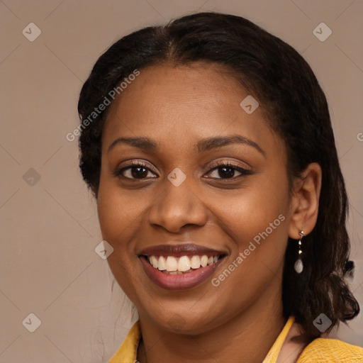 Joyful latino young-adult female with medium  brown hair and brown eyes