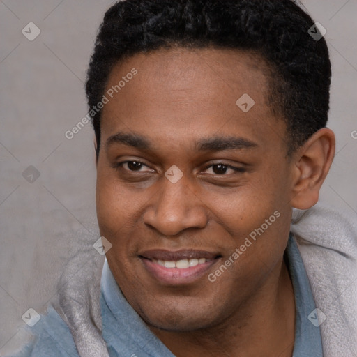 Joyful latino young-adult male with short  brown hair and brown eyes