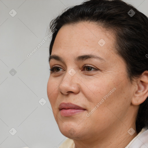 Joyful white adult female with short  brown hair and brown eyes