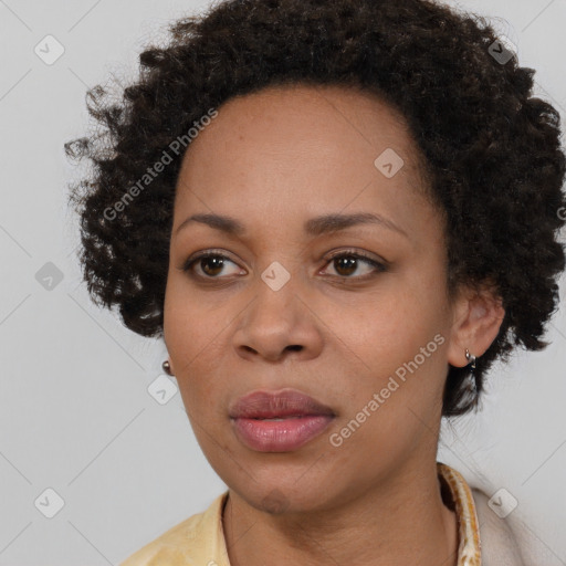 Neutral black young-adult female with short  brown hair and brown eyes