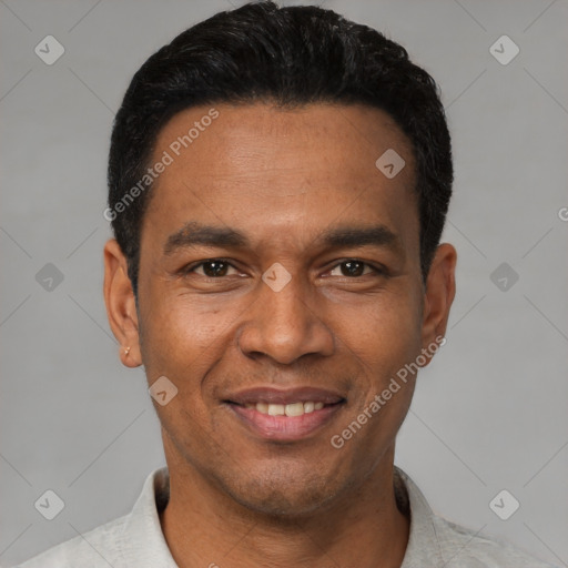 Joyful latino young-adult male with short  black hair and brown eyes