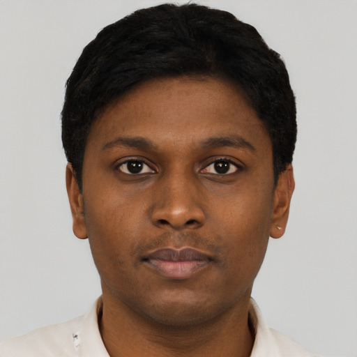 Neutral black young-adult male with short  brown hair and brown eyes