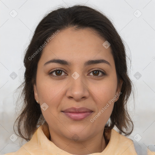 Joyful latino young-adult female with medium  brown hair and brown eyes