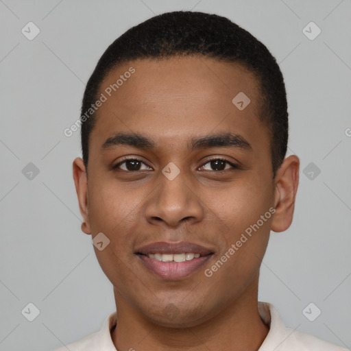 Joyful black young-adult male with short  black hair and brown eyes