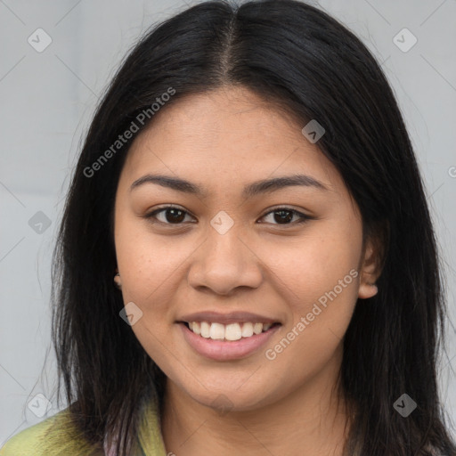 Joyful asian young-adult female with long  brown hair and brown eyes