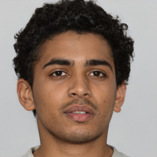 Neutral black young-adult male with short  brown hair and brown eyes