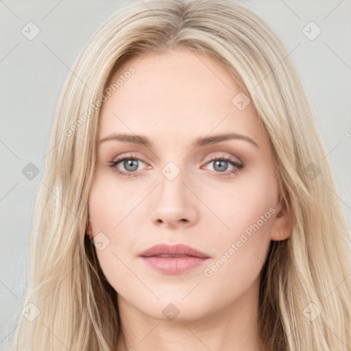 Neutral white young-adult female with long  brown hair and blue eyes