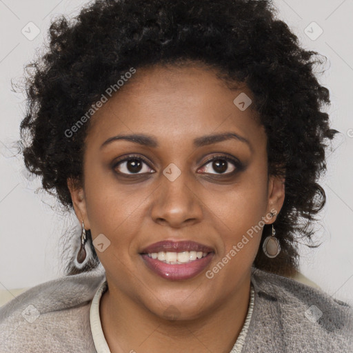 Joyful black young-adult female with long  brown hair and brown eyes