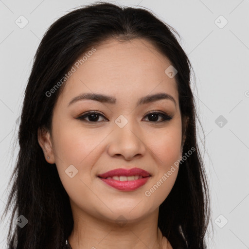 Joyful asian young-adult female with long  brown hair and brown eyes