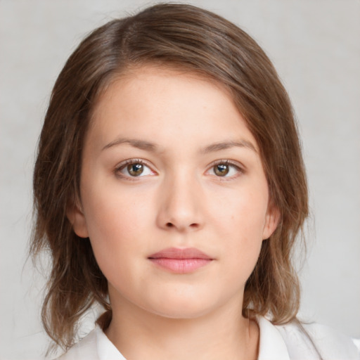 Neutral white young-adult female with medium  brown hair and brown eyes