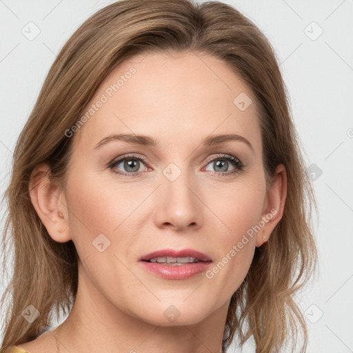 Joyful white young-adult female with long  brown hair and blue eyes