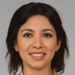 Joyful asian young-adult female with medium  brown hair and brown eyes