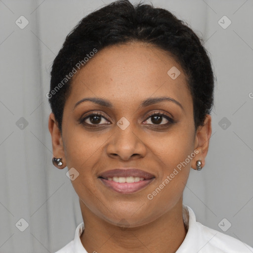 Joyful black young-adult female with short  brown hair and brown eyes