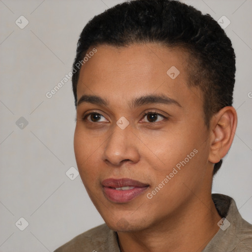 Joyful latino young-adult male with short  black hair and brown eyes