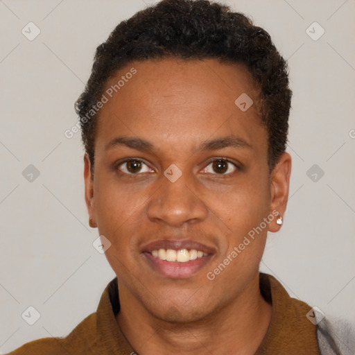Joyful black young-adult male with short  brown hair and brown eyes