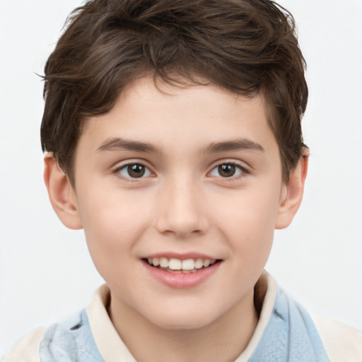 Joyful white child male with short  brown hair and brown eyes