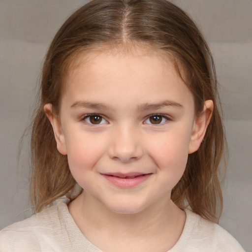 Joyful white child female with medium  brown hair and brown eyes