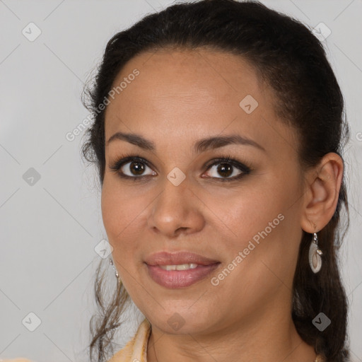 Joyful black young-adult female with medium  brown hair and brown eyes