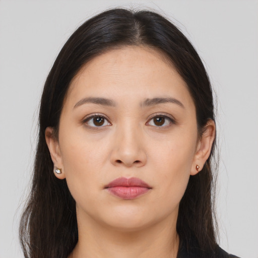 Neutral white young-adult female with long  brown hair and brown eyes