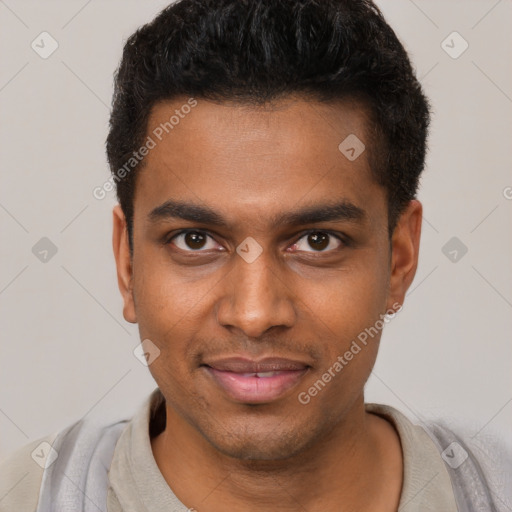 Joyful black young-adult male with short  brown hair and brown eyes