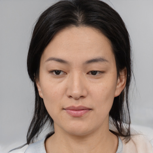 Neutral asian young-adult female with medium  black hair and brown eyes