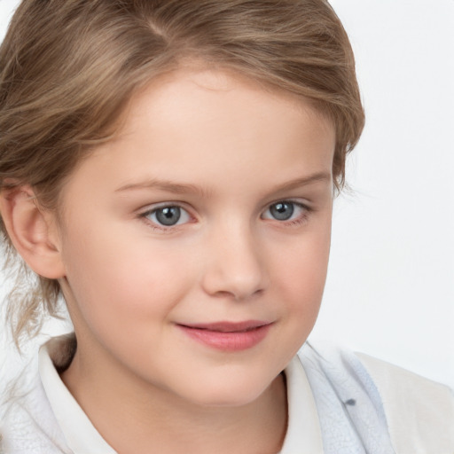 Joyful white child female with short  brown hair and grey eyes