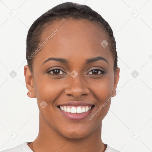 Joyful black young-adult female with short  brown hair and brown eyes