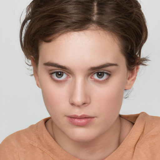 Neutral white young-adult female with medium  brown hair and brown eyes