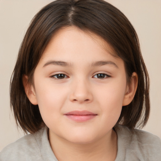 Joyful white child female with medium  brown hair and brown eyes