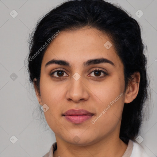 Joyful latino young-adult female with medium  black hair and brown eyes