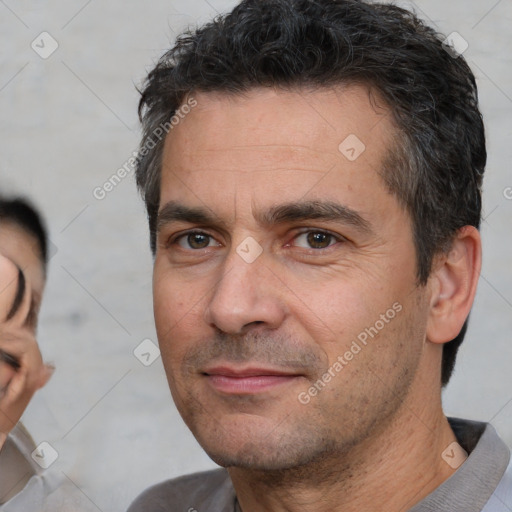 Neutral white adult male with short  brown hair and brown eyes