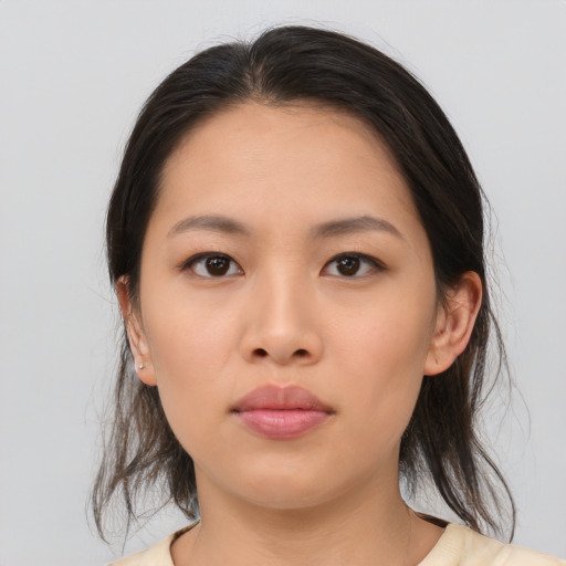 Neutral asian young-adult female with medium  brown hair and brown eyes