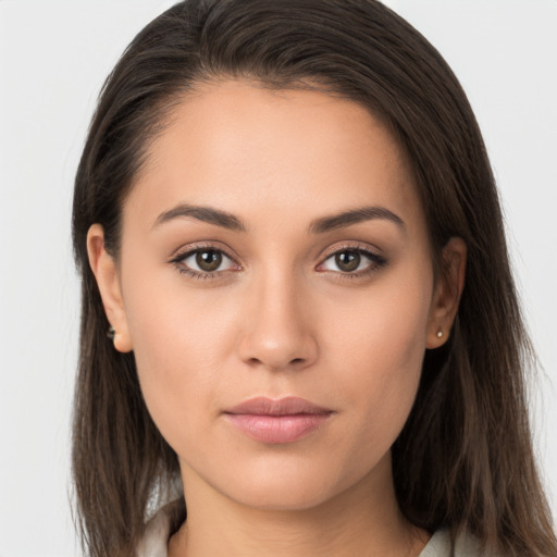 Neutral white young-adult female with long  brown hair and brown eyes