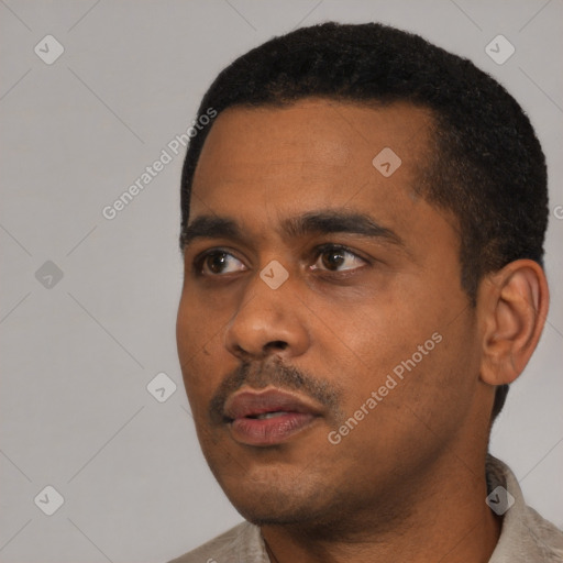Neutral black young-adult male with short  black hair and brown eyes