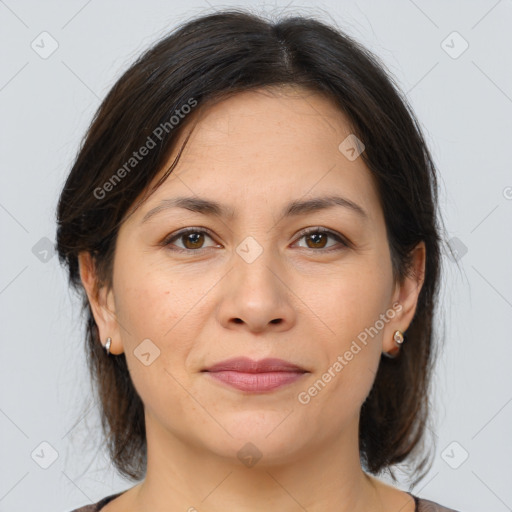 Joyful white adult female with medium  brown hair and brown eyes