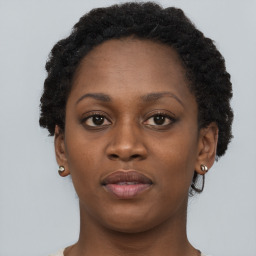 Neutral black young-adult female with short  brown hair and brown eyes