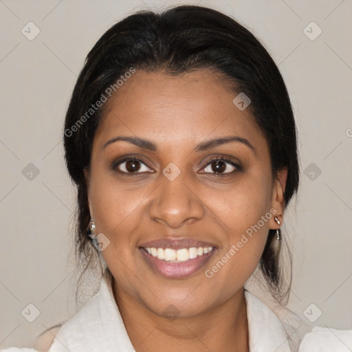 Joyful black young-adult female with medium  brown hair and brown eyes