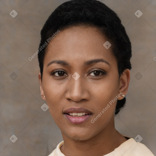 Joyful black young-adult female with short  black hair and brown eyes