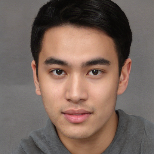 Neutral white young-adult male with short  black hair and brown eyes