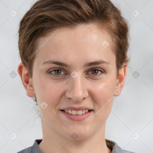 Joyful white young-adult female with short  brown hair and grey eyes