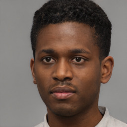 Neutral black young-adult male with short  brown hair and brown eyes