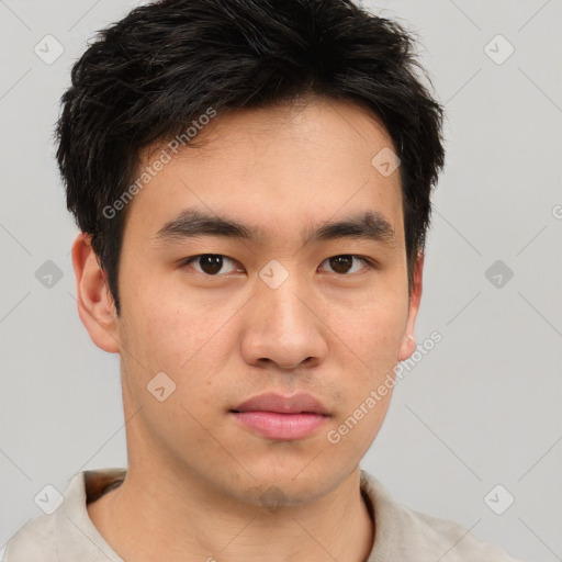 Neutral asian young-adult male with short  brown hair and brown eyes