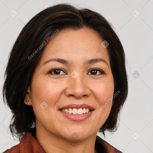 Joyful white adult female with medium  brown hair and brown eyes