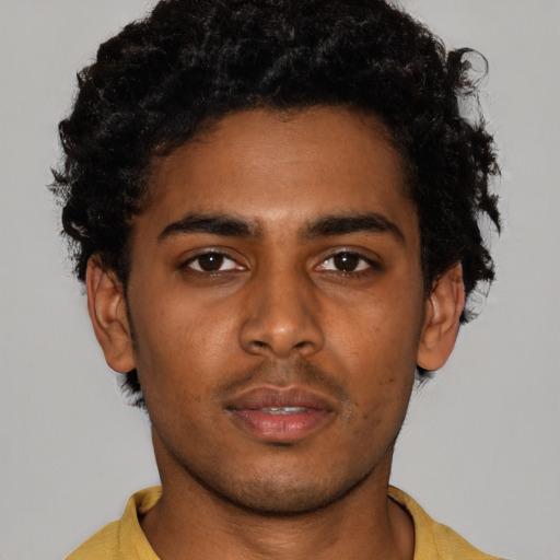 Neutral black young-adult male with short  brown hair and brown eyes